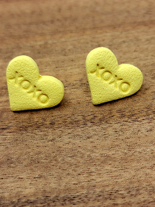 Yellow candy heart studs
