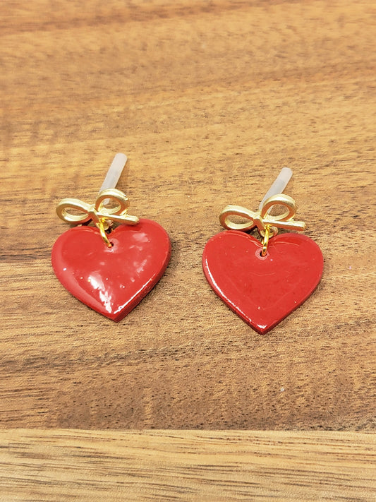 Red hearts dangles with gold bow top