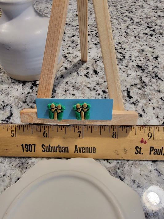 Green and gold painted present studs
