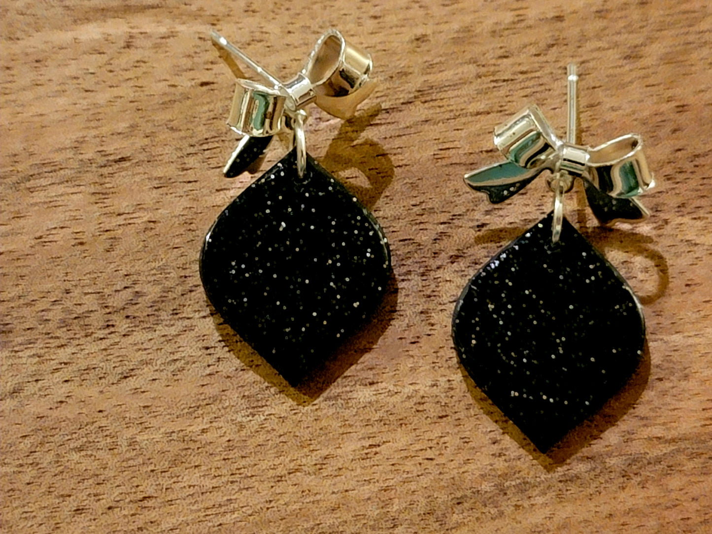Black and silver bow dangles