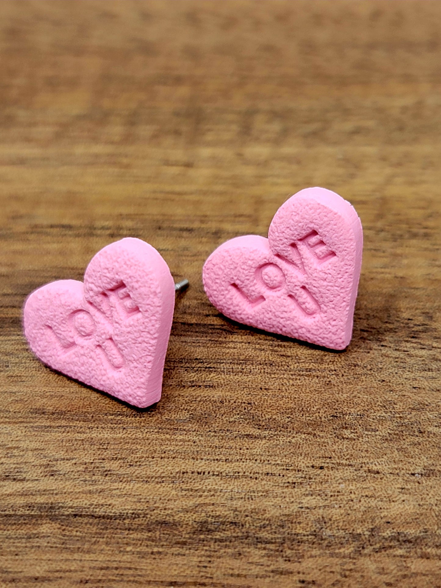 Pink conversation hearts studs