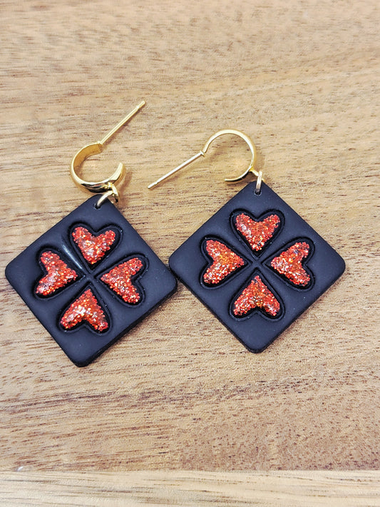 Embossed red glittery hearts dangles