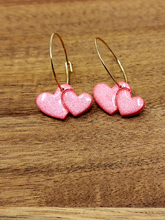 Shimmery pink double heart hoops