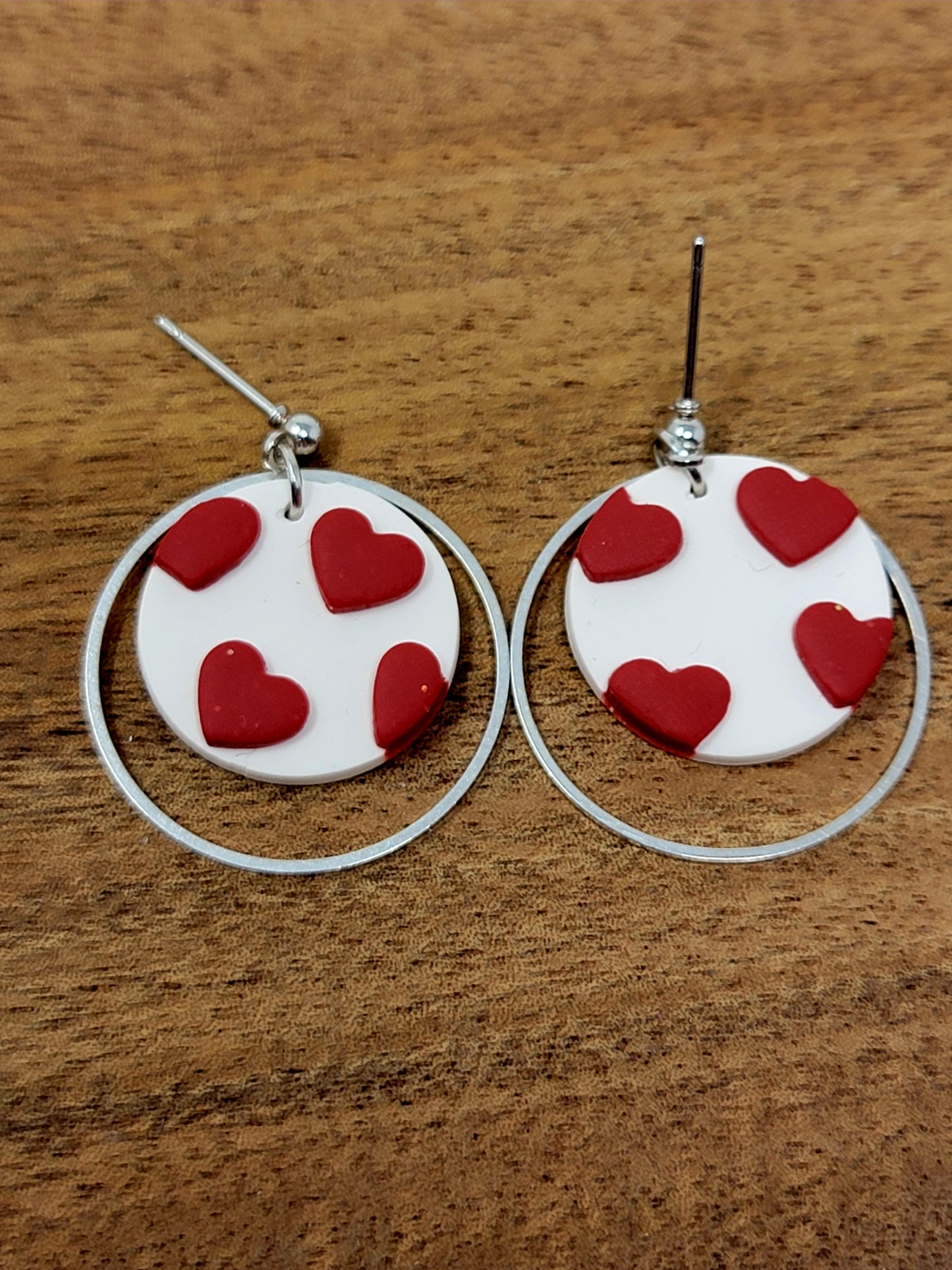 Falling hearts dangles with silver hoop